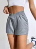 Dameshorts Casual solide asymmetrische elastische taille -track met pocket zomer sportkleding losse motorrijder streetwear Y2K 230325