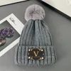 2023 Designer Fluffy Bean Cap Women Men Men Luxe schedel Cap gebreide pet Fashion Wol Hat Winter Outdoor Furry Snow Cap 5A Kwaliteit