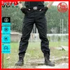 Pantalons pour hommes Vêtements de travail pantalons tactiques militaires pantalons de travail pour hommes combats vêtements tactiques spéciaux de la police pantalons décontractés noirs multi-poches W0325