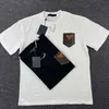 Camisetas de hombre Diseñador de lujo bolsillo de cuero patchwork camiseta para hombre sudadera de algodón cadena de hip hop camiseta de manga corta mujer cuello redondo jersey top ZY7W