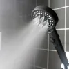 Nouveau pommeau de douche économie d'eau noir 5 Mode douche haute pression réglable une touche arrêt Massage de l'eau Eco douche salle de bain accessoires