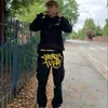 Męskie spodnie Hip Hop żółty druk zwykły spodni mężczyźni czarne ładunki haremowe spodnie męskie joggery dresowe mody streetwear odzież w lupgy ropa 230325