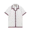 Chemises décontractées pour hommes Designer de luxe Chemise de bowling rose fleur imprimée pour hommes Hawaii Floral Men Short Sleeve