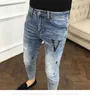 Jeans masculinos designer designer quente diamante impressão quebrada buraco líquido vermelho slim fit pés coreano marca de moda azul nove pontos outono novo m2mi fgxf
