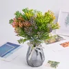 Fleurs décoratives plantes vertes artificielles en plastique décorations de séparation fruits étoilés à cinq fourches en pot. Pots de fleurs