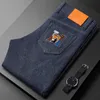 Mäns jeans designer ljus lyx 3D broderi blomma hästhuvud fjäder tunt high end water tvätt smal passande pants jgyz