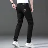 Mens Jeans Designer new spring summer men jean pure black white two-color cotton high elastic small foot slim fitting Korean Medusa embroidered pants