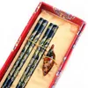 Pałeczki odpoczywają prezent biznesowy pałeczka drewniana chińska ziarna smoka patyki uchwytu