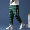 Herenbroek 2023 Nieuwe Koreaanse mode-unisex All-match trendy flanel brede broek losse streetwear joggers Harajuku plaid broek acht pant W0325