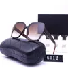 Lunettes de soleil de haute qualité de créateurs de luxe 20% de réduction sur les lunettes de mode de voyage de tir de rue à l'étranger 6012