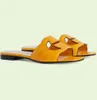 Nytt topp varumärkeslåsande sandaler skor kvinnors utskuren glidlägenheter tidlös sommarslip på kvinnliga flip flops perfekta trevliga lady tofflor sko eu35-42