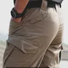 Men's Pants Pantalon Cargo pour hommes, pantalon tactique multi-poches pour hommes, pantalon de Combat militaire décontracté, imperméable, pantalon de randonnée, grande taille 6Xl W0325