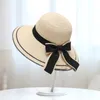 Cappelli a tesa larga per le donne Fashion Summer Big Bowknot Beach Bonnets Bucket Caps Ladies Protezione solare Cappelli di pagliaWide Davi22