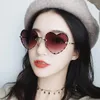 Lunettes de soleil 2023 Fashion Luxury Rimless Metal Frame Heart Women Femmes Rétro Gradient Brand Designer UV400