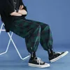 Herenbroek 2023 Nieuwe Koreaanse mode-unisex All-match trendy flanel brede broek losse streetwear joggers Harajuku plaid broek acht pant W0325