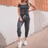 Kvinnors jumpsuits Rompers 2023 Summer Black Jumpsuit Women Off Shoulder Kvinna Kort ärm Elegant Romper Beach totalt sett