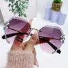 Designer Men's and Women's Beach Couple Sunglasses 20% Off Rhinestone slim frameless trimming Fashion anti-UV Korean glasses