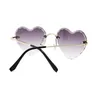 Lunettes de soleil 2023 Fashion Luxury Rimless Metal Frame Heart Women Femmes Rétro Gradient Brand Designer UV400