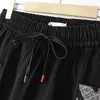 Kadın Artı Boyutu Pantolon 5XL Kot Giyim Gevşek Baskılı Düğme Cepler Yıkanmış Yüksek Bel Streç Kot Harem 230325