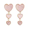 Boucles d'oreilles créoles une paire de beaux cadeaux fins de fée d'amour de mode avec des perles à clipser sur le goujon