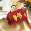 Present Wrap 10st Leather Wedding Box Creative Handbag Shape Bow-Knot Temperament Solid Color Candy med Hand DIY Packaging Bag