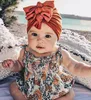 帽子ベイビーハットターバンフラワーボウ生まれた少女ビーニーキャップ秋の冬の幼児幼児の子供ボンネットポグラル小道具