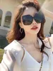 2024 10% OFF Luxury Designer New Men's and Women's Sunglasses 20% Off Individualized 7789 Large Frame Fashion Online Red Street Photo