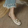 Nxy sandalen dames sandalen metaal decoratie vaste kleur vierkant teen dames flats Romeinse retro klassieke achterste riem riem gespannen vrouw schoenen 230322