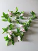 Fleurs décoratives 1 Pcs 2.45M Roses Soie Réaliste Guirlande Feuille Verte Fil De Fer Fleur Artificielle Vigne Rotin Pour Mariage Décor Feuillage DIY