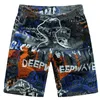 Shorts masculinos Streetwear 2022 Shorts de praia de verão Men, troncos impressos masculinos curtos da cintura elástica seca rápida shorts w0327