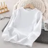 T-shirty Spring Kids Girls Białe koszulki bawełniane pullover długie rękawy dla dużych chłopców zwykłe stałe kolorowe koszule nastoletnie ubrania 230327