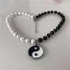 Chaînes Hip-hop Fashion Style Huit diagrammes en forme de collier Apéritif Pendentif Yin Yang Couple de perles noires et blanches