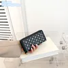 Großhandel Damen Umhängetaschen 2 Farben Straße Persönlichkeit Niet Punk Clutch Bag Multi-Card verschleißfeste Lederbrieftasche Reißverschluss Dekoration Frauen lange Brieftasche 522