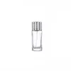 Klar rund form glas parfym flaska 20 ml 30 ml 50 ml bärbar förpackning silver spändpump med silverskydd på återfyllningsbar förpackningsbehållare