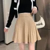 Skirts Ashgaily Knit Pleated Women High Waist Sweater Autumn Winter Solid Elastic Knitting Ribbed Mini 230327