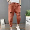 Herrbyxor 2023 Ankomst Män ankellängd twill topp mode last harem lösa rippade stort hål och små ben jeans capris