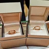 Paarringe klassische Stil Frau Männer Ringe goldene exquisite Geschenke mit Schachtel feine Handwerkskunst in den Größen 5 bis 12 erhältlich