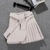 Юбки элегантная асимметричная юбка Женщины Весна лето высокая талия мини -юбки Сексуальная женщина корейская сплошная черная белая плиссированная юбка 230327