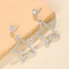 Boucles d'oreilles pendantes creuses tendance Simulation cristal longue femme Vintage brillant Arc barre fil gland goutte cadeaux