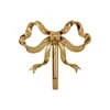 Ganci Rails Golden Bowknot Rame Bagno Appendiabiti Portasciugamani Soggiorno Sfondo Display Decorazione domestica moderna 230327