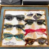 Högkvalitativ fashionabla lyxdesigner solglasögon New P Family Cat's Eye Women's Ins Network Red samma stil Personliga metallsolglasögon PR94WS