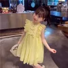 女の子のドレスガールズサマーサンドレス幼児の赤ちゃんのruflessタンクドレス女の子のための黄色のノースリーブ弓プリンセスドレスチドルレン服の服