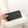 Großhandel Damen Umhängetaschen 2 Farben Straße Persönlichkeit Niet Punk Clutch Bag Multi-Card verschleißfeste Lederbrieftasche Reißverschluss Dekoration Frauen lange Brieftasche 522