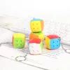 미니 큐브 키 체인 마술 큐브 3 단계 루빅스 큐브 키 체인 퍼즐 초보자를위한 초보자 전문 큐보 마술 장난감 어린이 어린이 크기는 3x3x3입니다.