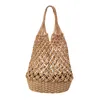 Strandväskor Ny Hollow Cotton Rope Bucket Bag Straw Woven Fishing Net Beach Casual och mångsidig modeväska för kvinnor 230327