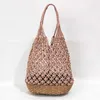 Strandväskor Ny Hollow Cotton Rope Bucket Bag Straw Woven Fishing Net Beach Casual och mångsidig modeväska för kvinnor 230327