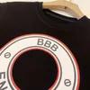 Designer Baby Kids Camicie Moda Lettera Abbigliamento Ragazzi Maglietta di lusso Maglietta estiva a maniche corte con stampa di lettere Abbigliamento per bambini