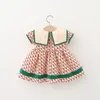 Flickas klänningar sommar baby flickor kort ärm jordgubbslapa krage plädtryck prinsessan fest veckade barn barn klänning vestidos 230327