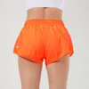 L091 Ingebouwde doorlopende yogashorts met trekkoord Dames Joggingbroek met verborgen rits Zijzakken Laagbouw Korte broek Ademend Sneldrogende sportshorts