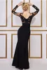 Czarne sukienki wieczorne syreny koronkowe sukienki na studniowe suknie balowe długie rękawy Sheer Jewel Neck Długość podłogi Backless Formal Sukienka dla kobiet